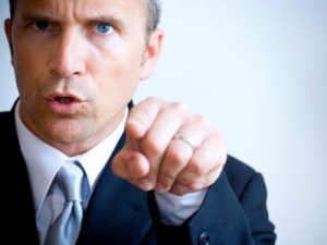 man-suit-angry-pointing-istock