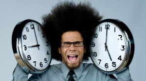 office-worker-stressed-with-9-to-5-clocks-jpg
