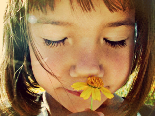 childwithflowerstock