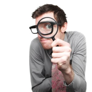 man_with_magnifying_glass